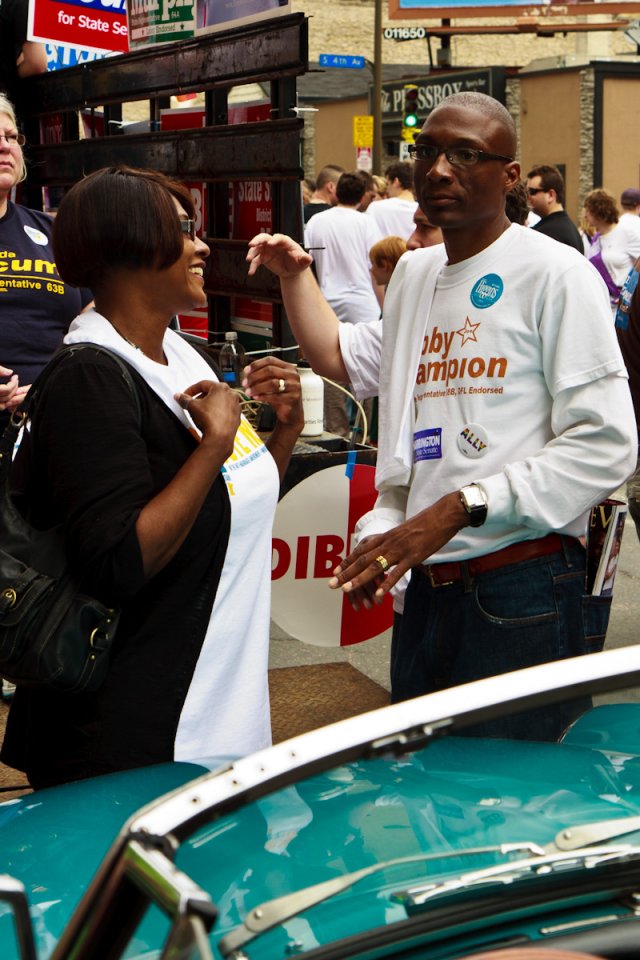 Rep. Rena Moran talks with Rep. Bobby Joe Champion.